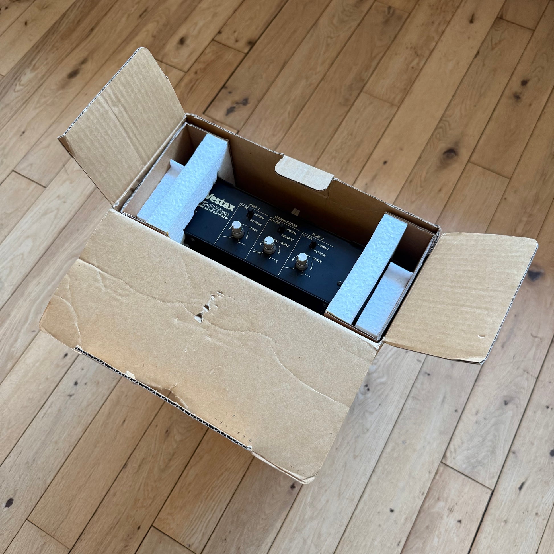 Close up of a Vestax PMC-07 Pro housed within its original shipping box.