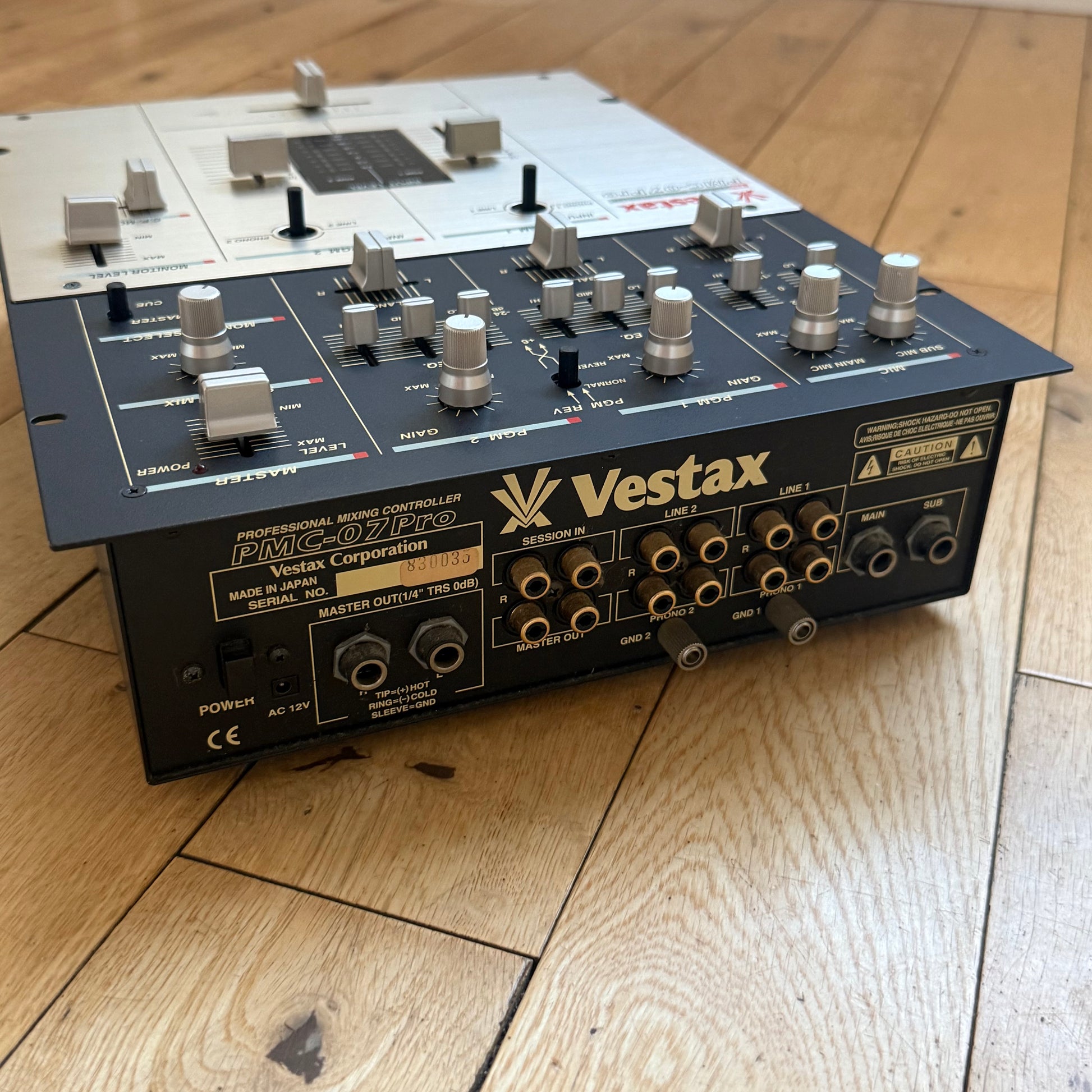 Rear panel of a Vestax PMC-07 Pro with the serial 830035.